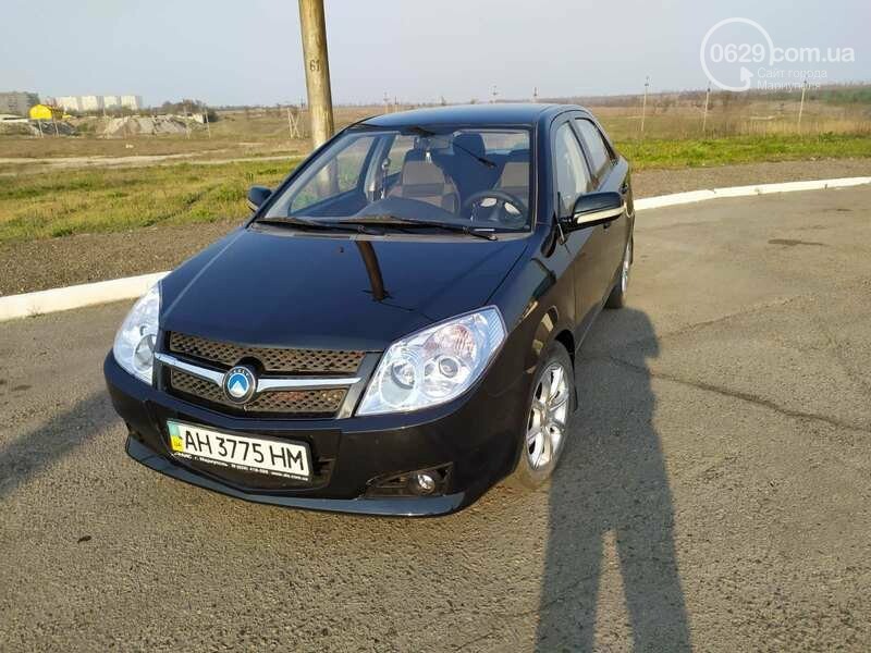 Черный geely mk